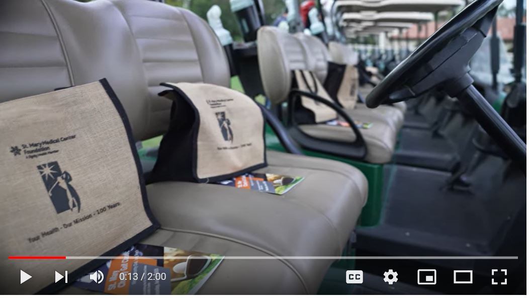golf tournament cart with gift bag