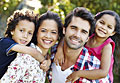 Man, woman and two children - Hispanic family